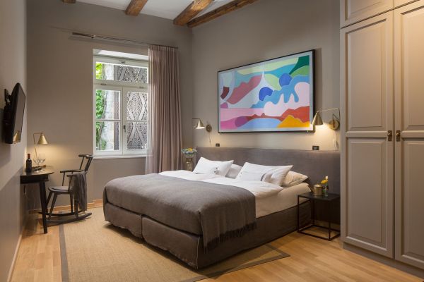 Discover Standard Double Room 'Garbin' at Almayer Art & Heritage Hotel. Spacious and versatile with king-sized or separated twin beds.